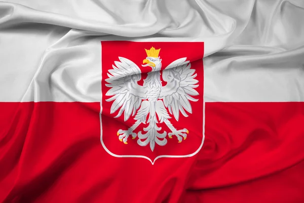 Macha flagą Polski z herbu — Zdjęcie stockowe