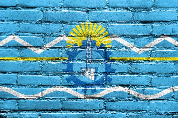 Bandiera della Provincia di Chubut, Argentina, dipinta su muro di mattoni — Foto Stock