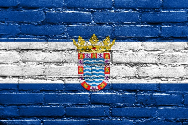 Jerez, Andalúzia, Spanyolország, festett, a tégla fal zászlaja — Stock Fotó