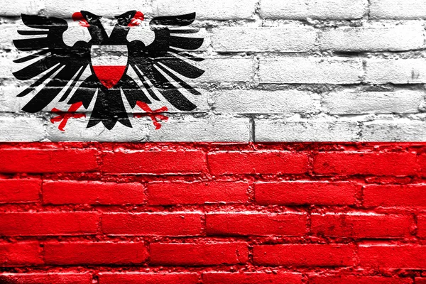 Flag of Lubeck, Germany, painted on brick wall — Stock Photo, Image