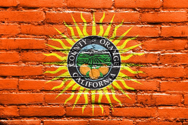 レンガの壁に描かれたオレンジ ・ カウンティー、カリフォルニア、米国の旗 — ストック写真