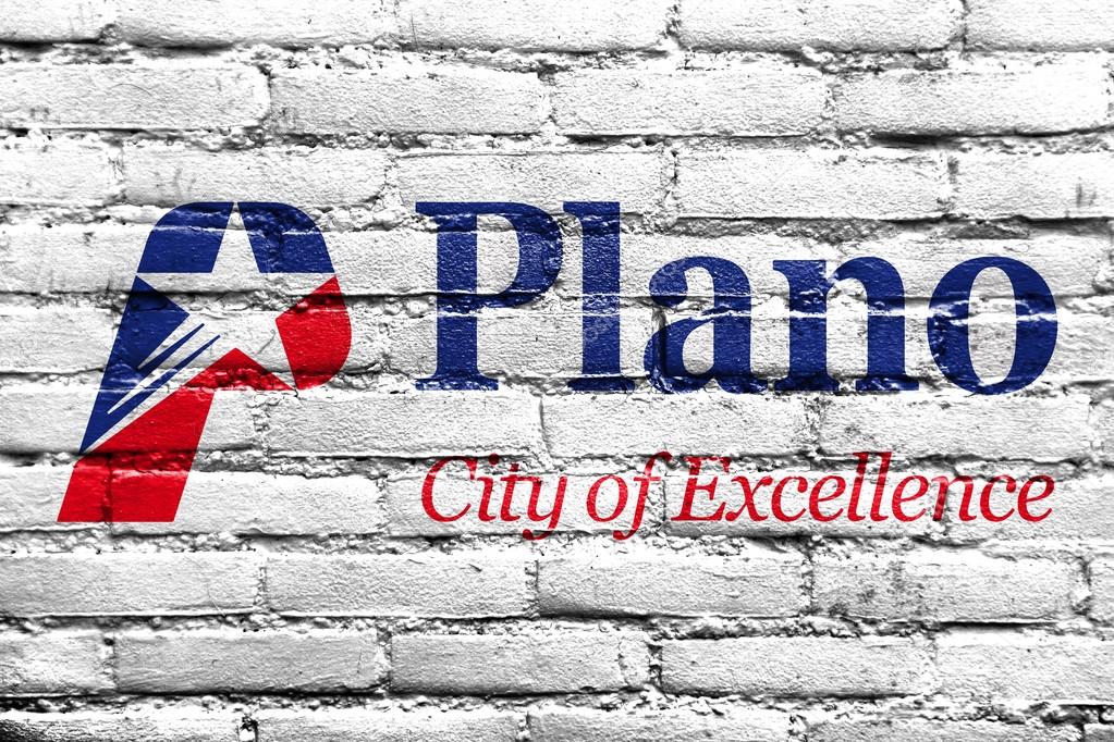 Flag of Plano, Texas, USA, painted on brick wall