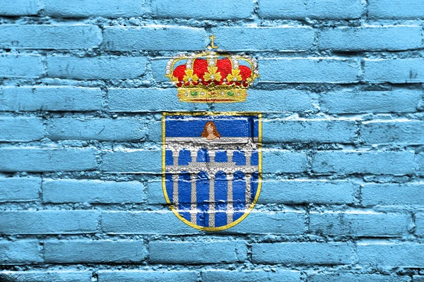 Флаг Сеговии, Испания, расписанный на кирпичной стене — стоковое фото