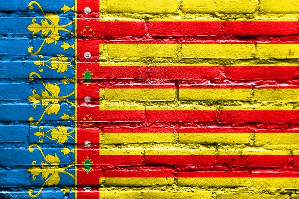 Bandeira da Comunidade Valenciana, Espanha, pintada na parede de tijolos — Fotografia de Stock