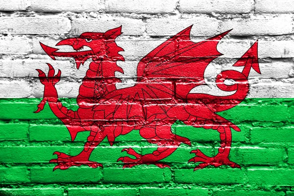 Wales, Storbritannien, flagga målad på tegelvägg — Stockfoto