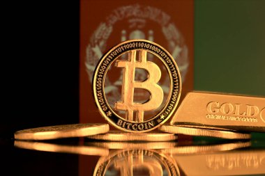 Bitcoin 'in fiziksel versiyonu, altın külçesi ve Afganistan Bayrağı.