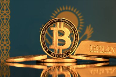 Bitcoin 'in fiziksel versiyonu, altın külçesi ve Kazakistan Bayrağı.