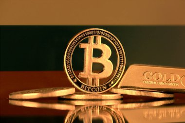 Bitcoin 'in fiziksel versiyonu, altın külçesi ve Litvanya Bayrağı.