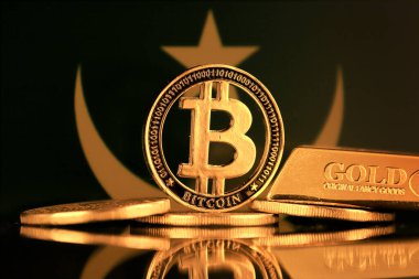 Bitcoin 'in fiziksel versiyonu, altın külçesi ve Moritanya Bayrağı.