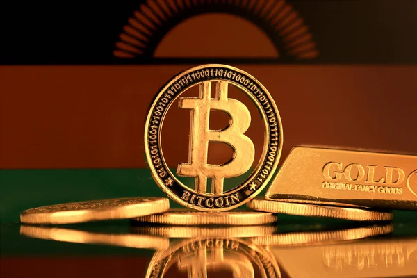 Bitcoin 'in fiziksel versiyonu, altın külçesi ve Malavi Bayrağı.