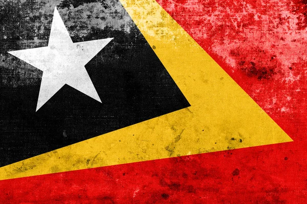 Doğu timor bayrağı ve eski bir vintage ile bakmak — Stok fotoğraf
