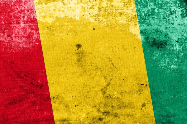 Vintage ve eski bir görünüm ile Gine bayrağı — Stok fotoğraf