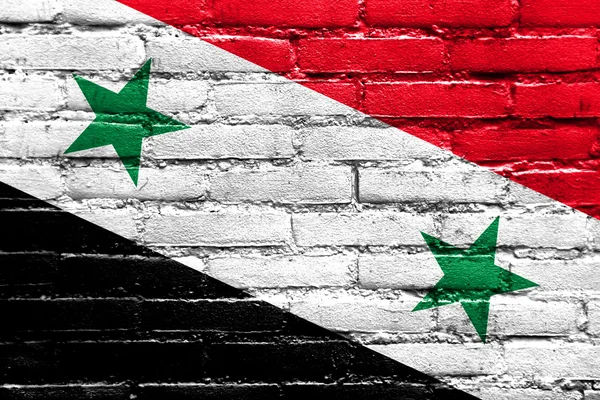 Siria Bandiera dipinta su muro di mattoni — Foto Stock