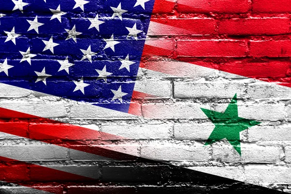 Flaga USA a Syrią malowane na mur z cegły — Zdjęcie stockowe