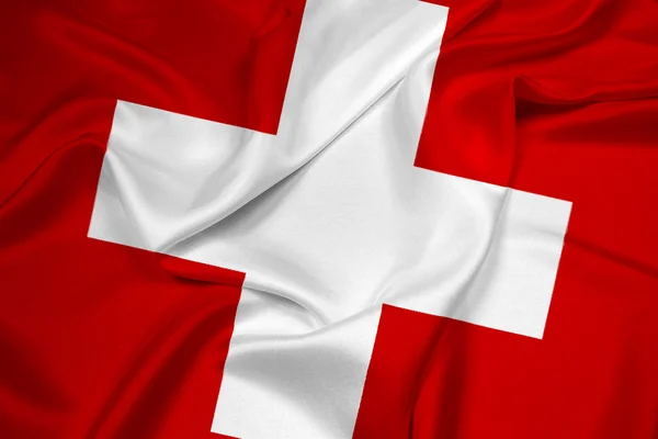 Vlající vlajka Švýcarska — Stock fotografie