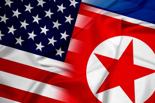 アメリカと北朝鮮の旗を振る — ストック写真