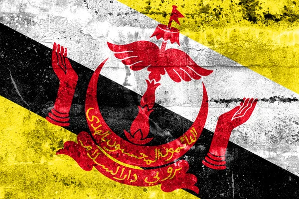 Bandera de Brunei pintada en la pared grunge —  Fotos de Stock