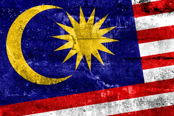 Malaysische Flagge an Grunge-Wand gemalt — Stockfoto