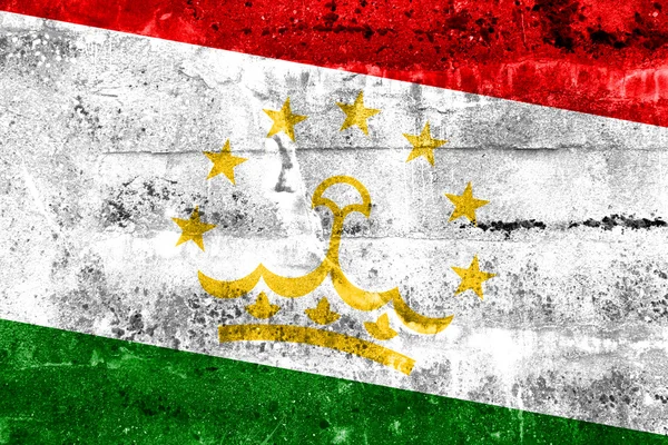 Флаг Таджикистана раскрашен на гранж-стене — стоковое фото