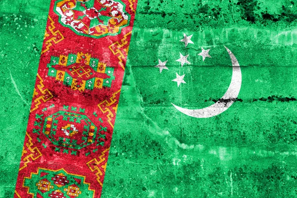 Turkmenistán Bandera pintada en la pared grunge —  Fotos de Stock