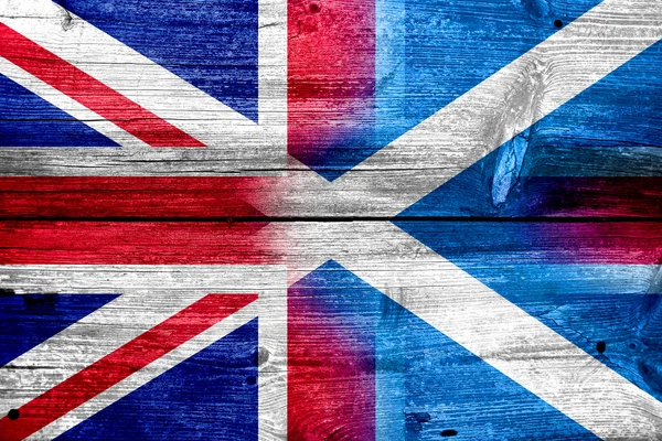 Scotland and United Kingdom Flag painted on old wood plank texture — Stock Photo, Image