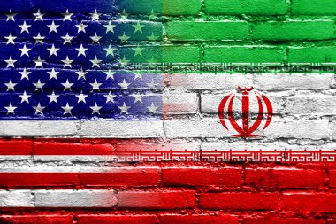 İran ve ABD bayrağı tuğla duvara boyalı