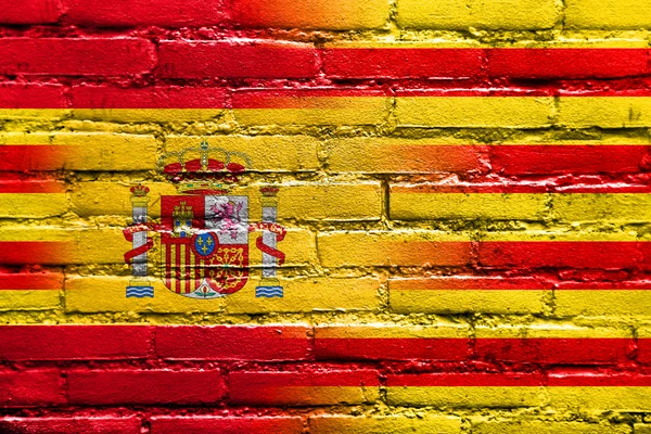 Σημαία της Ισπανίας και της Καταλονίας ζωγραφισμένο σε τοίχο από τούβλα — Φωτογραφία Αρχείου