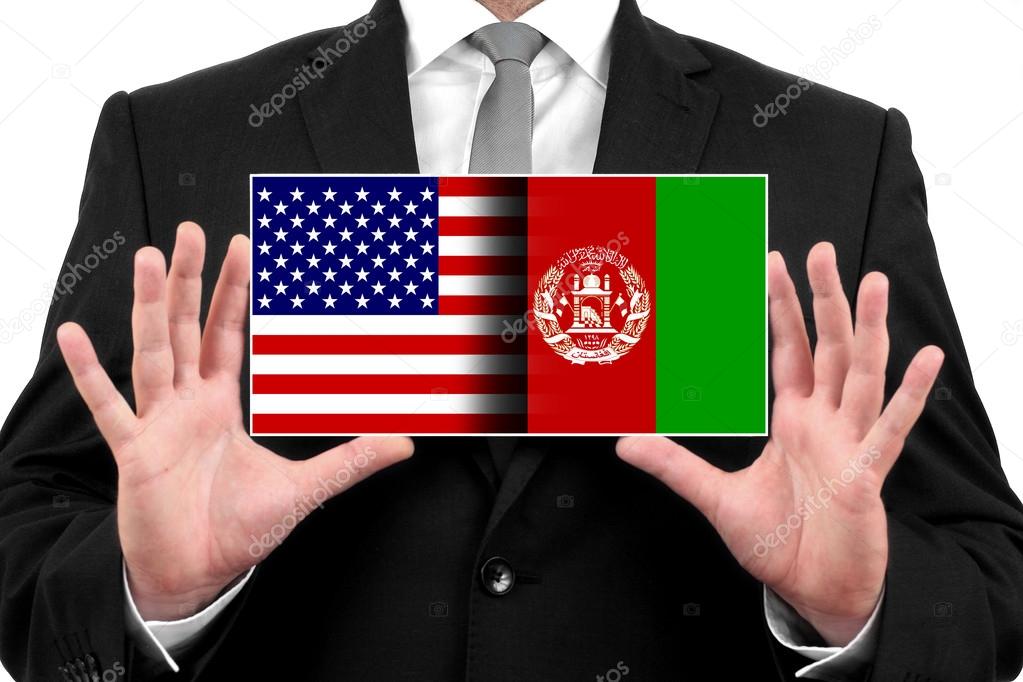 Businessman holding a business card with USA and Afghanistan Flag