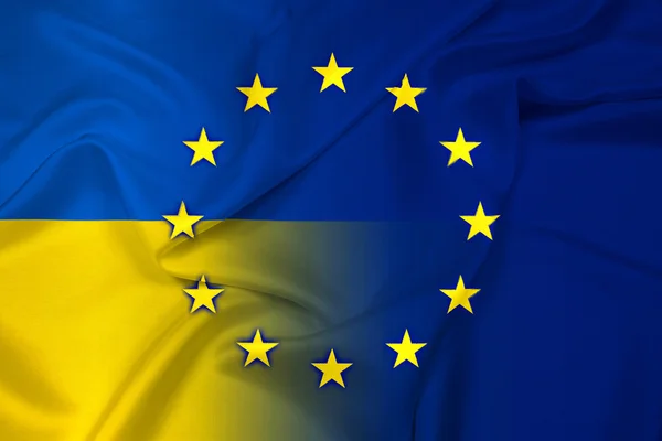 Schwenken ukrainische und europäische Gewerkschaftsfahne — Stockfoto