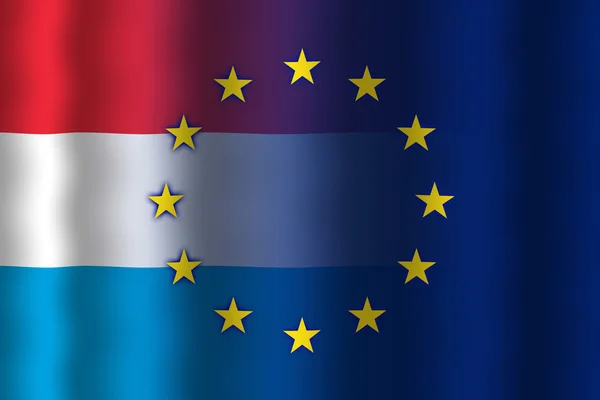 Brandissant un drapeau luxembourgeois et l'union européenne — ストック写真