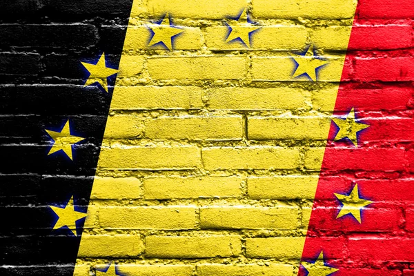 Bandera de Bélgica y de la Unión Europea pintada sobre pared de ladrillo — Foto de Stock