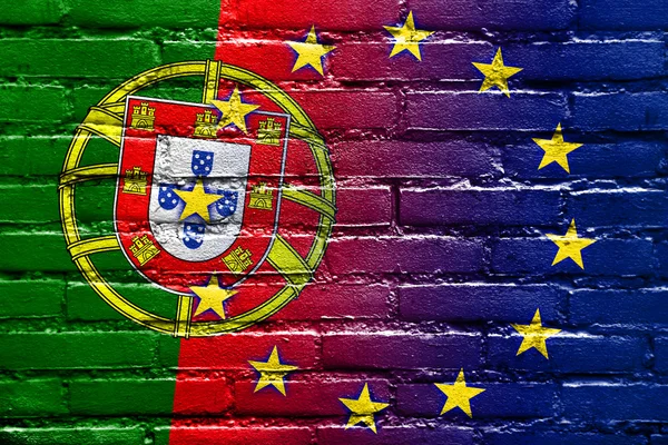 葡萄牙和欧洲联盟的国旗画在砖墙上 — 图库照片