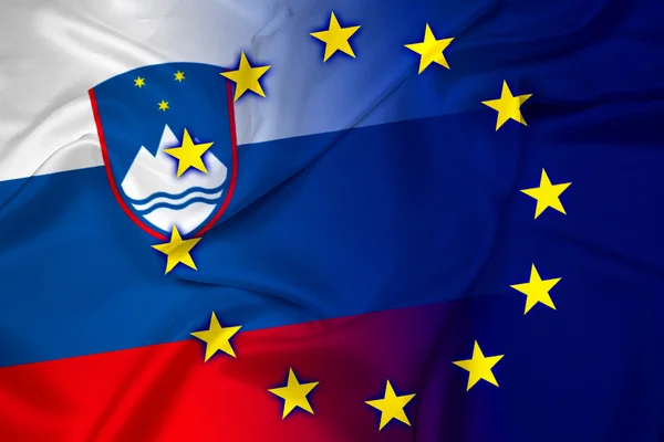Розмахував прапором Словенії та Європейського Союзу — стокове фото