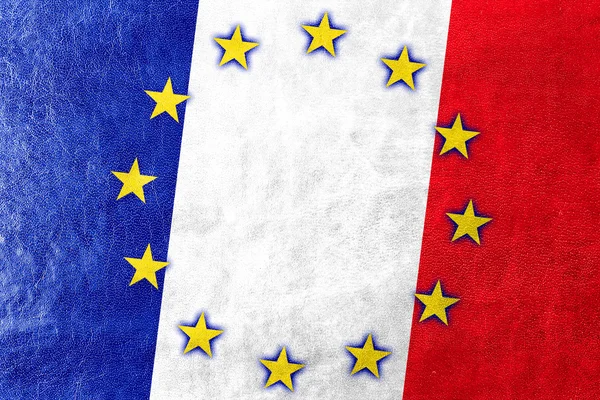 Frankrike och Europeiska unionens flagga målade på läder texture — Stockfoto