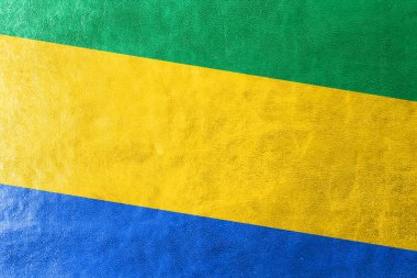 deri dokusu üzerinde boyalı gabon bayrağı
