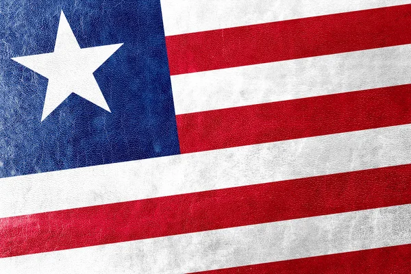 Liberia flaggan målad på läder texture — Stockfoto