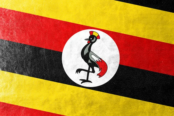 Ugandas Flagge auf Lederstruktur gemalt — Stockfoto