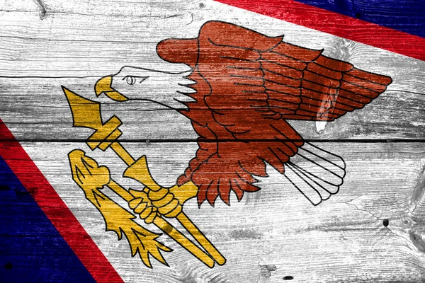 Samoa américaines Drapeau peint sur une vieille planche de bois — Photo