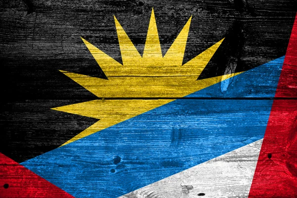 Antigua and Barbuda Flag painted on old wood plank texture — Stock Photo, Image