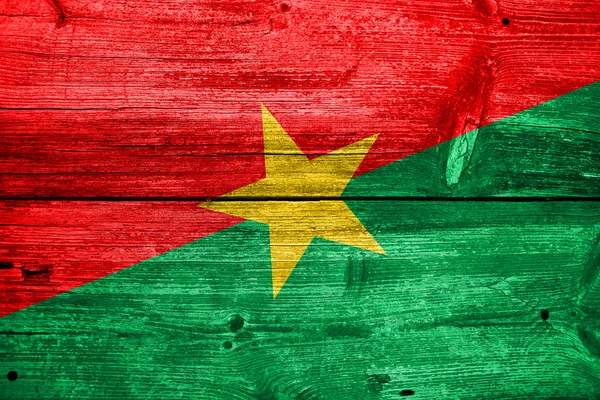 Burkina Faso Flag painted on old wood plank texture — Stock Photo, Image