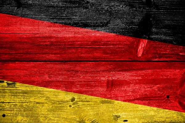 Germany flag painted on old wood plank background — Stock Photo, Image