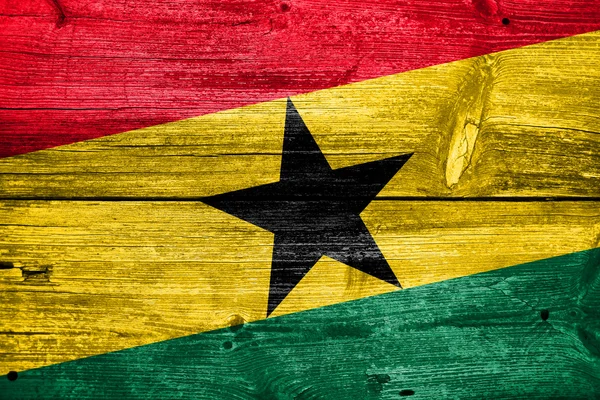 Bandera de Ghana pintada sobre madera vieja textura del tablón — Foto de Stock