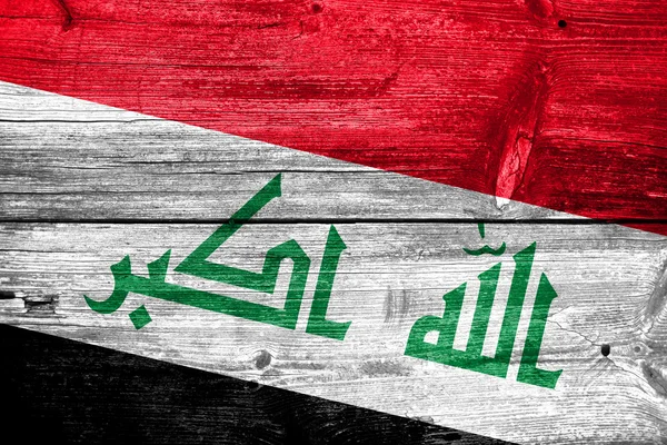 Irak vlag geschilderd op oude houten plank textuur — Stockfoto