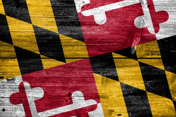 Vlajka státu Maryland na staré dřevěné prkenné textury — Stock fotografie