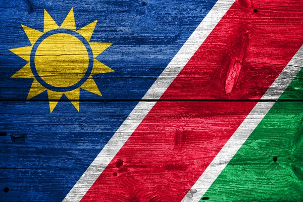 Namibia Flag painted on old wood plank texture — Stock Photo, Image