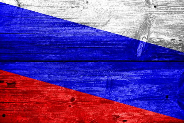Eski ahşap tahta zemin üzerine boyalı Rusya bayrağı — Stok fotoğraf
