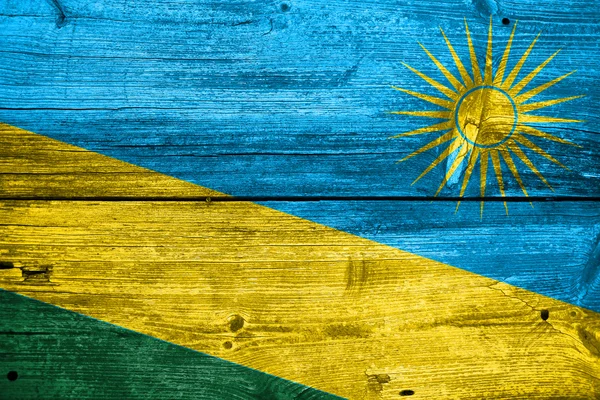 Rwanda Flag painted on old wood plank texture — Stock Photo, Image