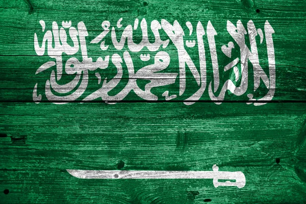 Bandera de Arabia Saudita pintada sobre madera vieja textura de tablón —  Fotos de Stock