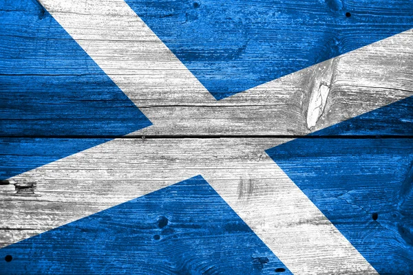 Bandeira da Escócia pintada na velha textura da prancha de madeira — Fotografia de Stock