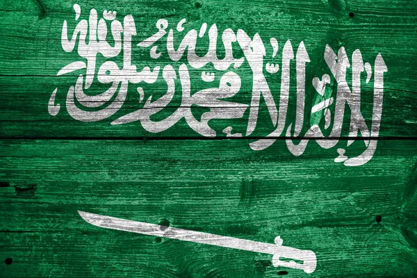 Bandera de Arabia Saudita pintada sobre madera vieja textura de tablón —  Fotos de Stock